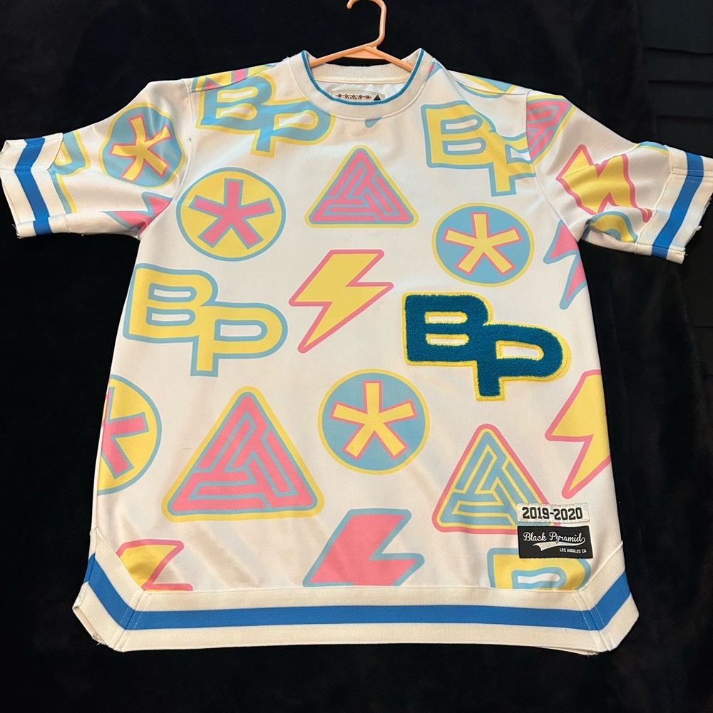 Black Pyramid White and Blue Jersey with Retro Geometric Patterns